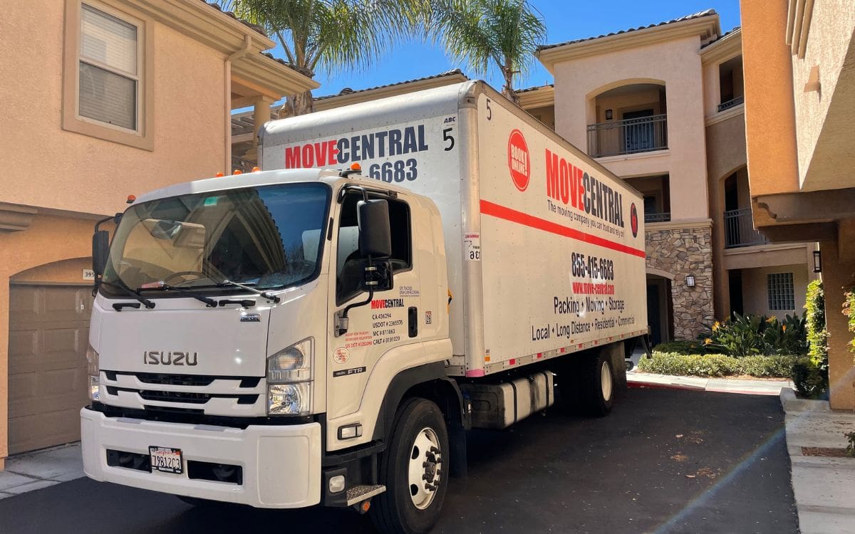 A Move Central moving truck parked at a residential property