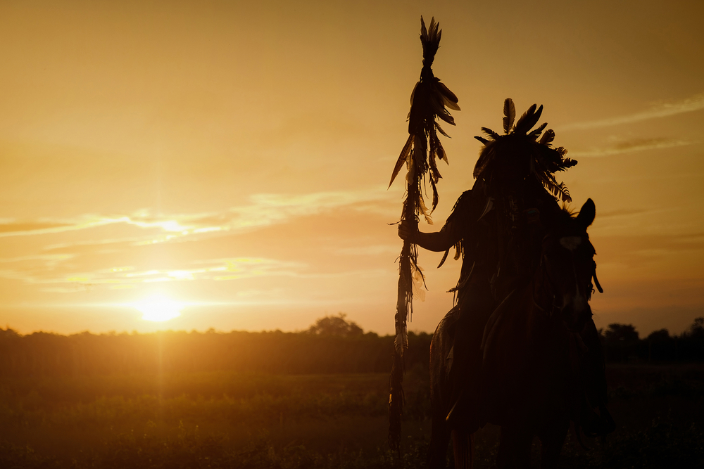 Native American watching Sunset
