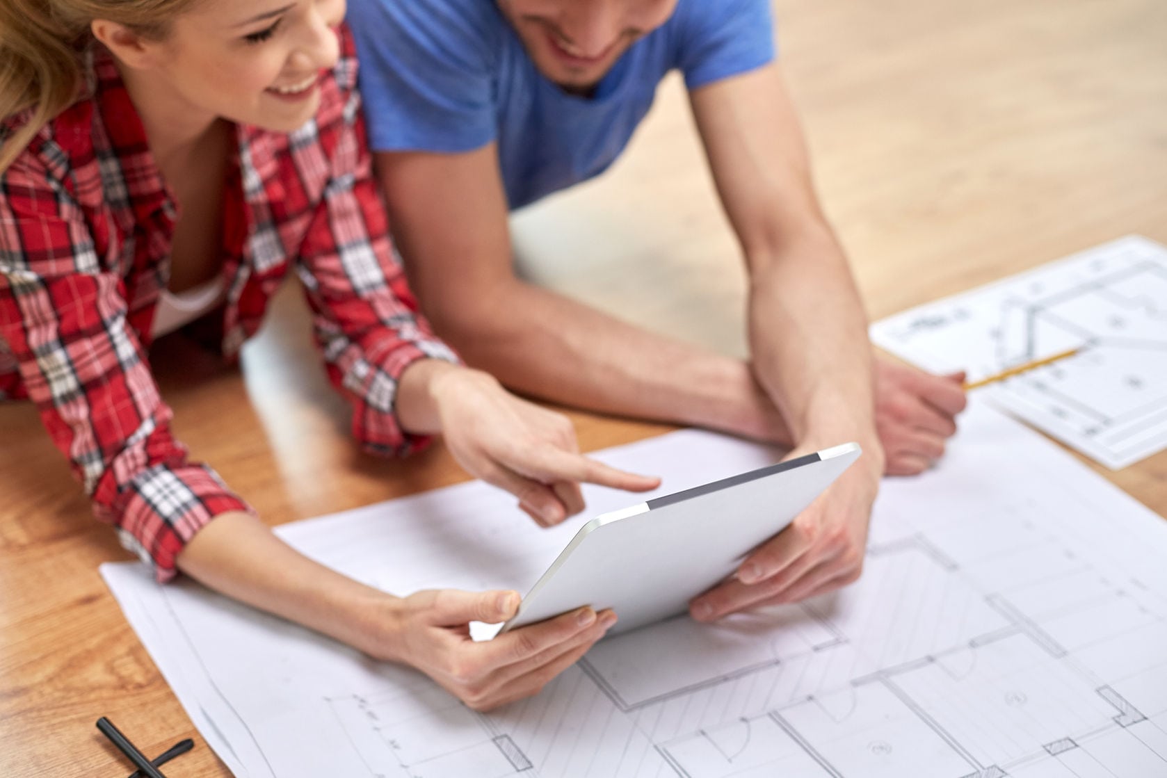 couple looking at house plans