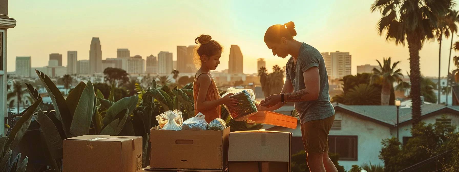 a family carefully packing fragile items into boxes with san diego's skyline in the background.