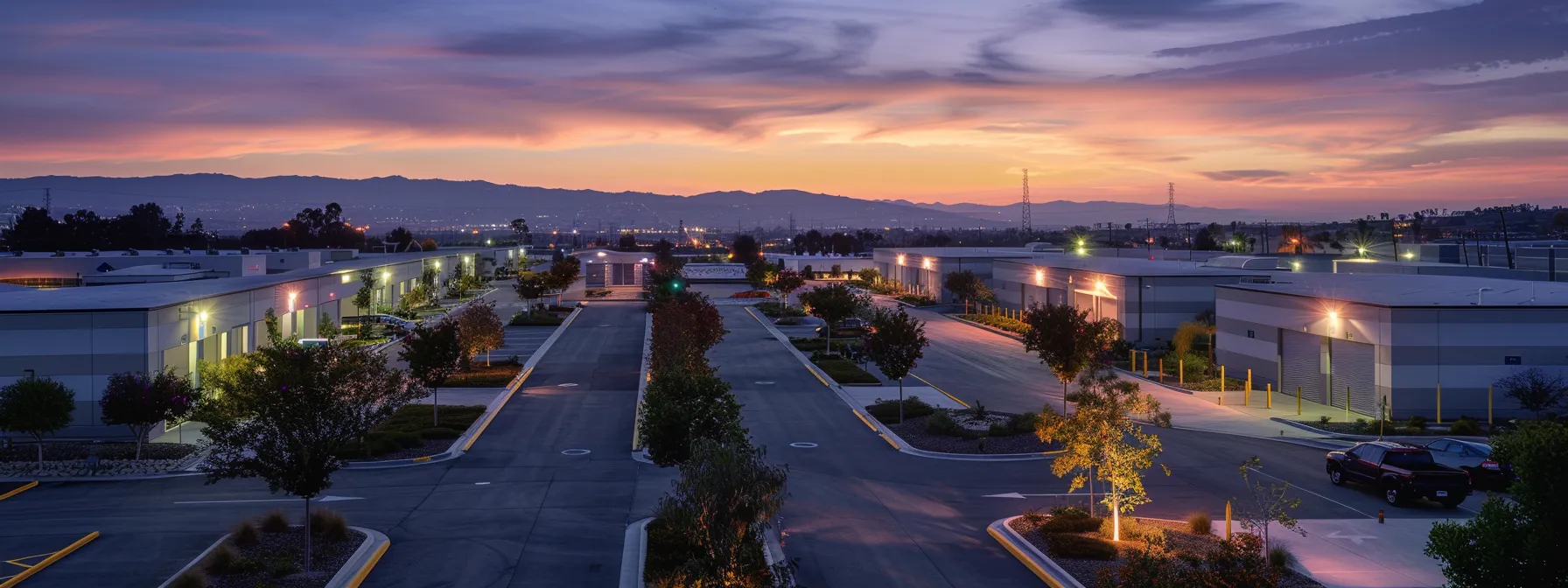 A Modern Storage Facility In Orange County, With Rows Of Secure White Units Under Bright Security Lights, Ensuring Protection For Valuables In Irvine, Ca (33.6839° N, 117.7947° W).